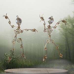EUC Gold Toned Wire Skeletons (2 Pc)
